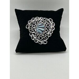 Vintage Sarah Coventry Silver-Tone Brooch With Blue Acrylic Center Filigree Desi